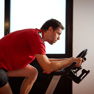 Timo Boll working out, cycling.